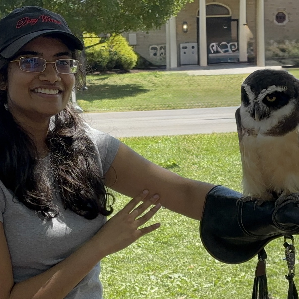 Picture of Shefali with Spectacled Owl named Latte (she looks cool, smart, and approachable! Shefali is also there.)